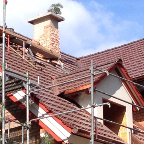 Neugestaltung der Dachansicht mit Gauben (36cm Holzfaserdämmung)